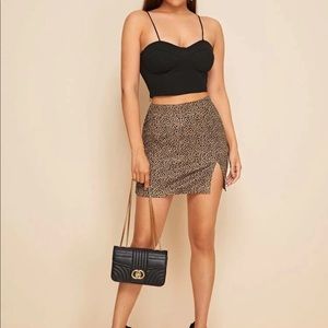 Split hem Dalmatian / leopard print mini skirt